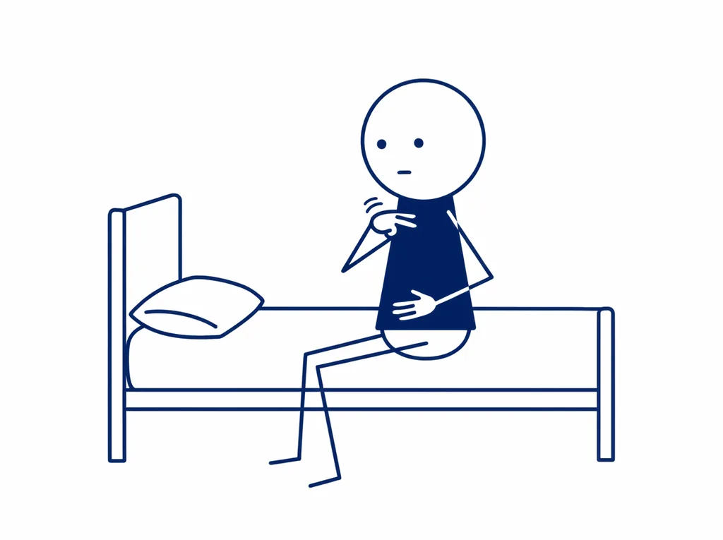 Een man zit op de rand van zijn bed met een hand op zijn buik. Met twee vingers van zijn andere hand klopt hij onder zijn sleutelbeen. De dag is voorbij en zijn lijf staat nog aan.
